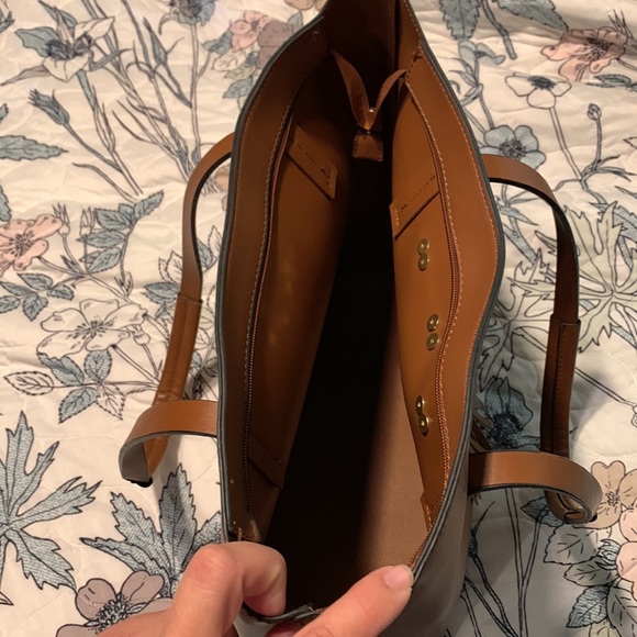 Classic tan faux leather tote with gold tone bit hardware and tassel details. - Picture 5 of 5